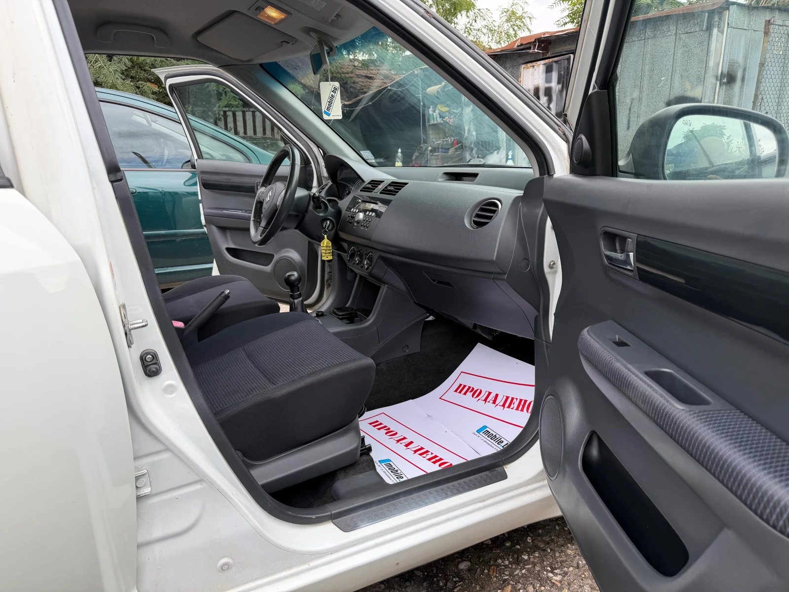 Suzuki Swift 1.3i 90HP KLIMA 2009G, снимка 14 - Автомобили и джипове - 56293897