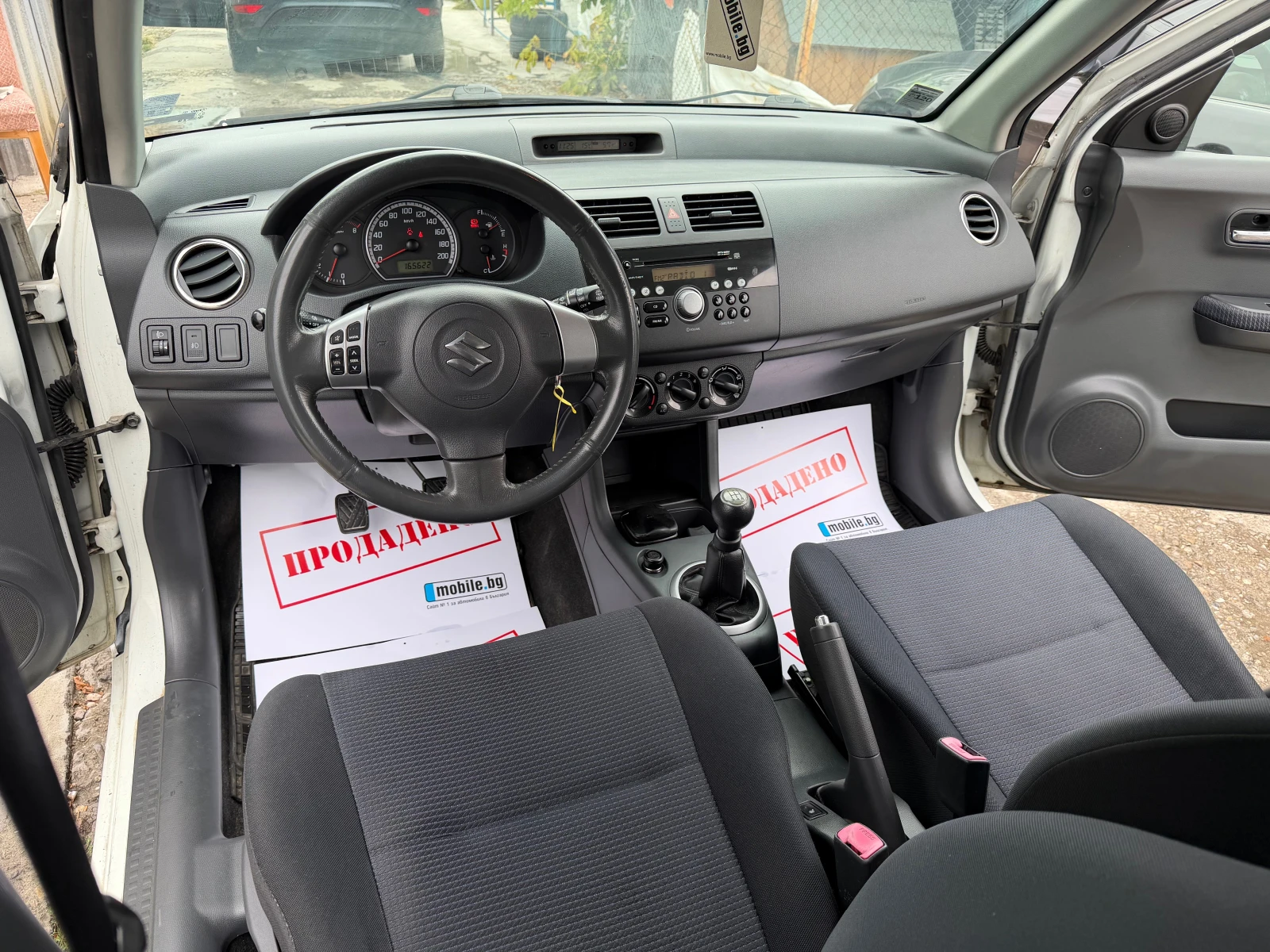 Suzuki Swift 1.3i 90HP KLIMA 2009G, снимка 11 - Автомобили и джипове - 56293897