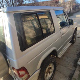 Hyundai Galloper, снимка 16 - Автомобили и джипове - 53635599