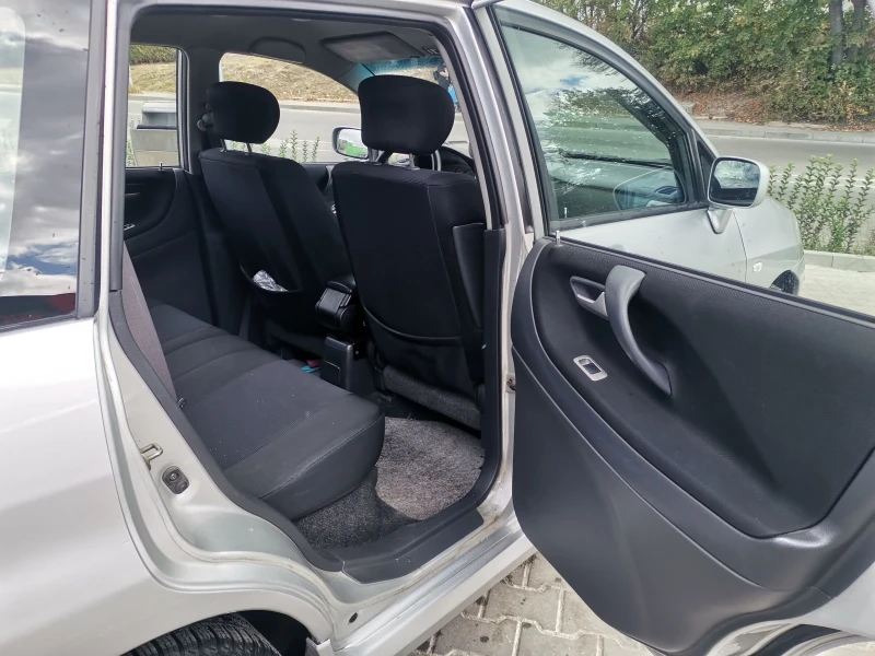 Suzuki Liana, снимка 6 - Автомобили и джипове - 51836066