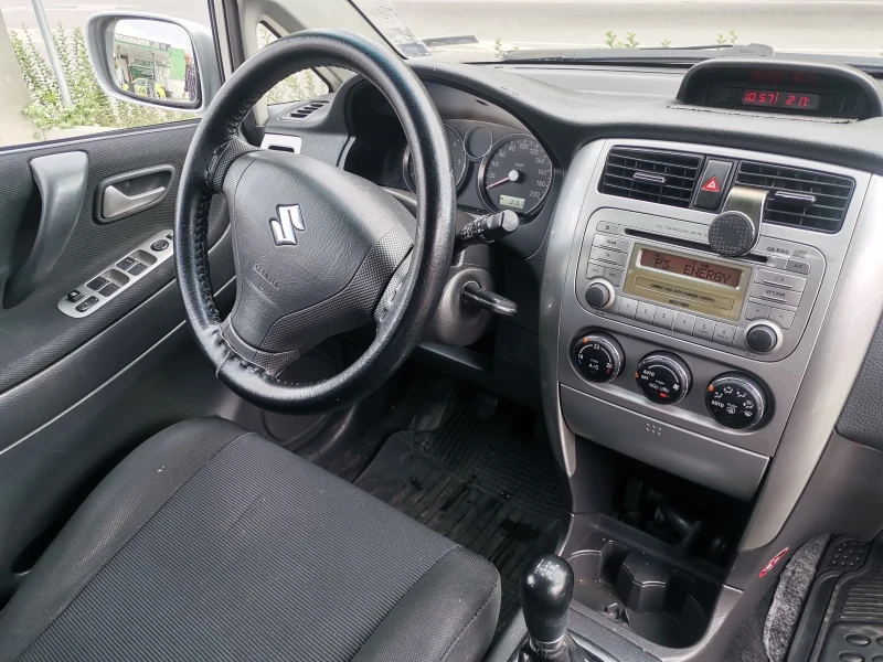 Suzuki Liana, снимка 8 - Автомобили и джипове - 51836066