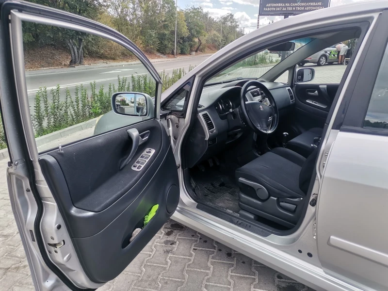 Suzuki Liana, снимка 4 - Автомобили и джипове - 51836066