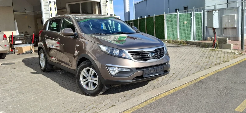 Kia Sportage 1.7 crdi Super Choko Color Navi Kamera Топ, снимка 7 - Автомобили и джипове - 47451374