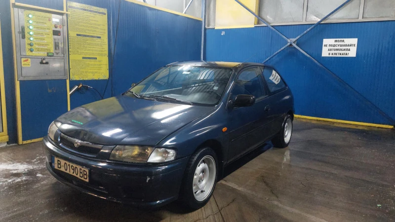 Mazda 323, снимка 2 - Автомобили и джипове - 46718319