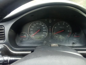 Subaru Legacy 2.5Газ/Автомат/4х4/Документално и технически ТОП - 1100 € / 2151.41 лв. - 30682939 6