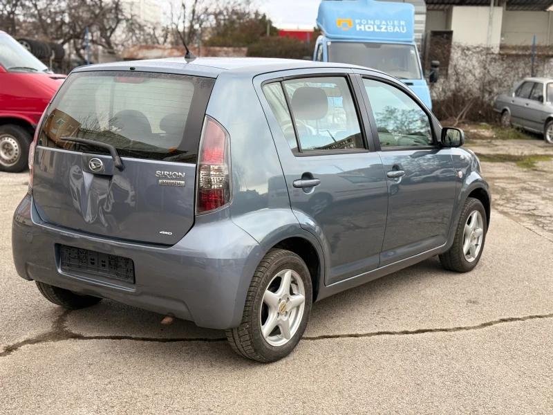 Daihatsu Sirion 1.3I-4x4, снимка 7 - Автомобили и джипове - 52662027