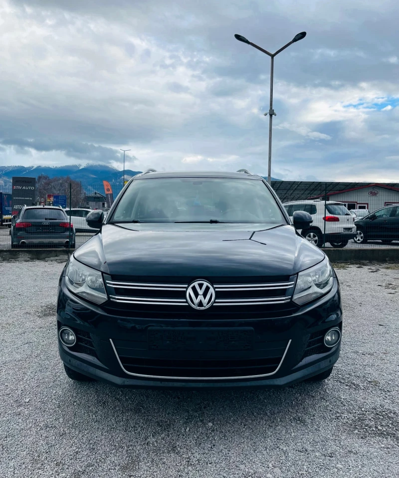 VW Tiguan 2.0 TDI 4Motion * Панорама* Сервизна история* , снимка 2 - Автомобили и джипове - 53398682