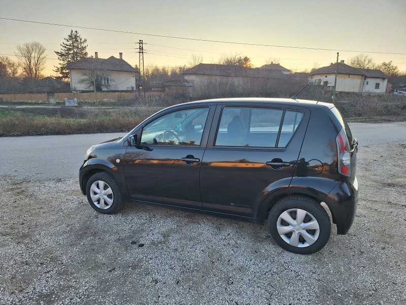 Daihatsu Sirion, снимка 15 - Автомобили и джипове - 48371126