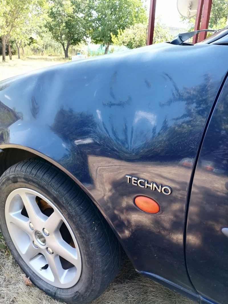 Ford Fiesta 1.25 16V Zetec, снимка 10 - Автомобили и джипове - 52344724