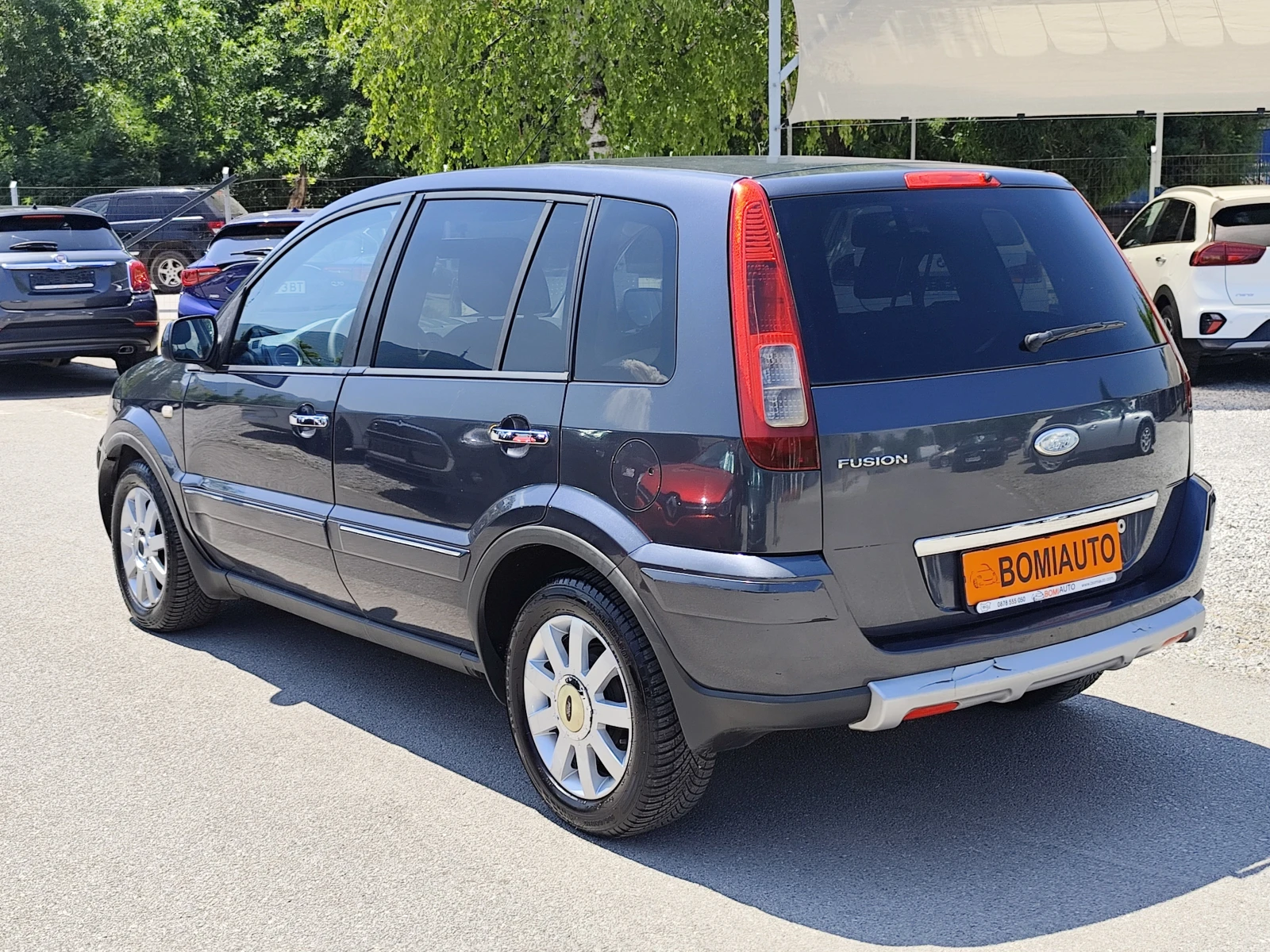 Ford Fusion 1.4i* ГАЗОВА УРЕДБА* КЛИМАТИК* , снимка 6 - Автомобили и джипове - 55331809