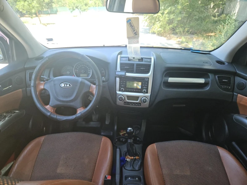 Kia Sportage, снимка 9 - Автомобили и джипове - 52345034