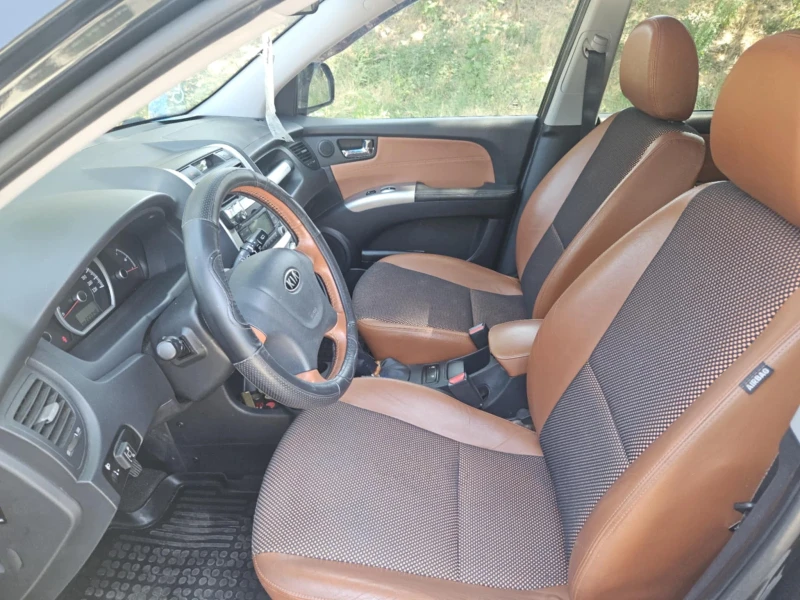 Kia Sportage, снимка 10 - Автомобили и джипове - 52345034