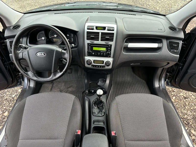 Kia Sportage 2.0CRDI 140kc 4x4, снимка 10 - Автомобили и джипове - 48545953