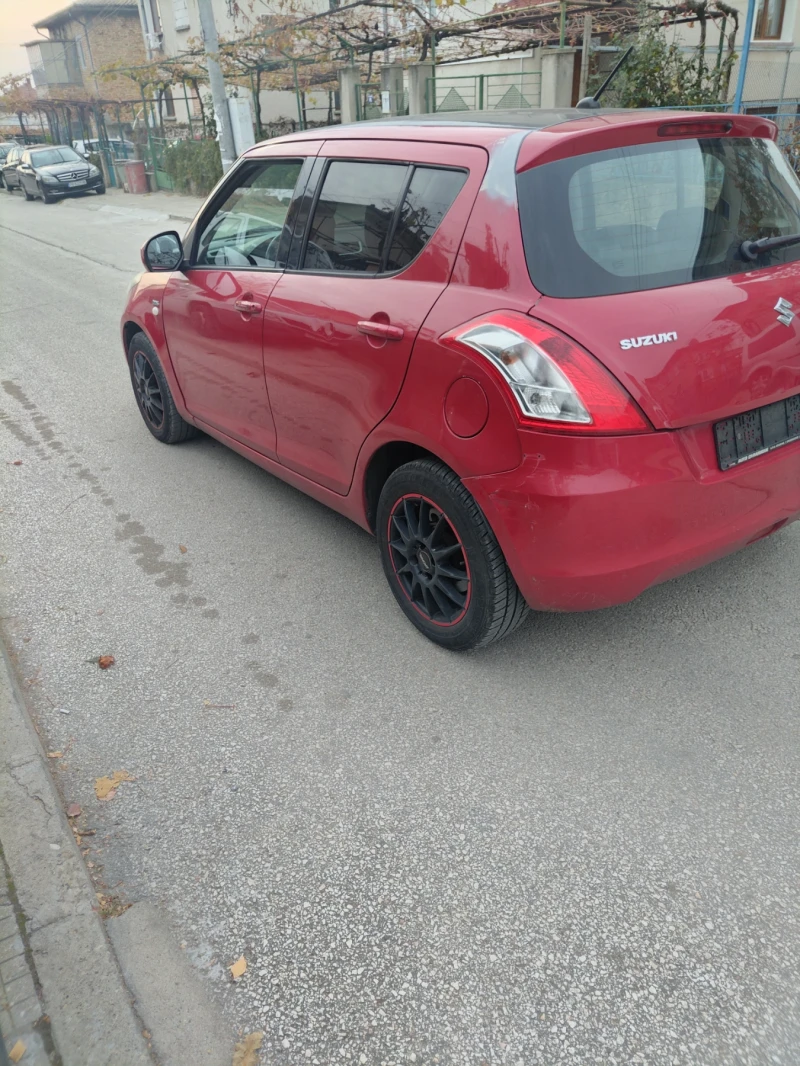 Suzuki Swift 1.3 DDIS , снимка 11 - Автомобили и джипове - 48371199