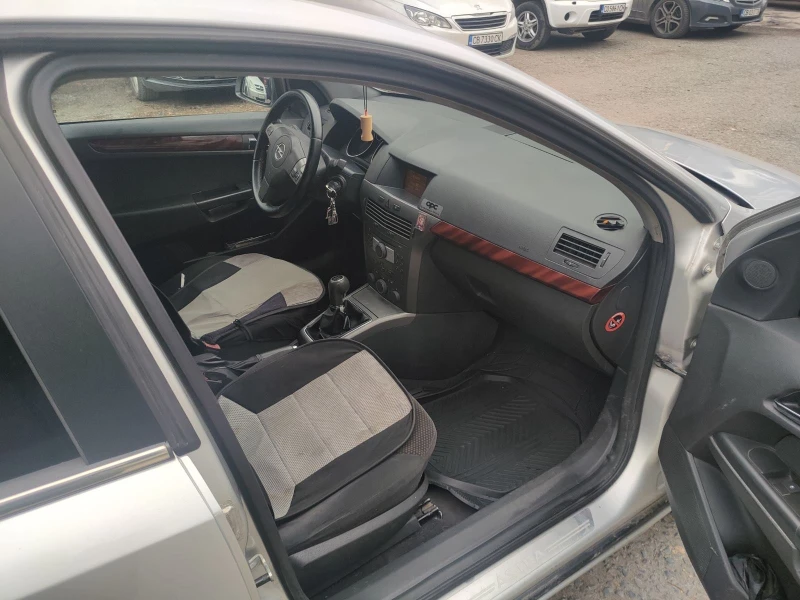 Opel Astra 1.9 CDTI, снимка 11 - Автомобили и джипове - 52743396