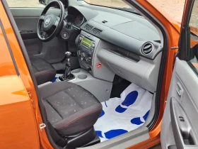 Mazda 2 1.25i, снимка 13