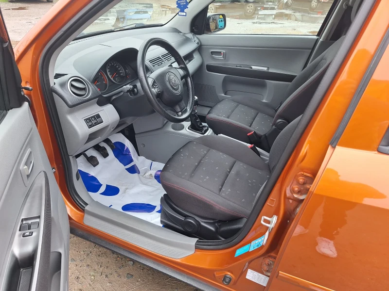 Mazda 2 1.25i, снимка 12 - Автомобили и джипове - 48350591