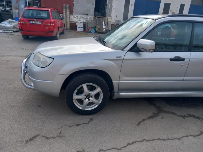 Subaru Forester 2.0 с газ, снимка 11 - Автомобили и джипове - 47736560