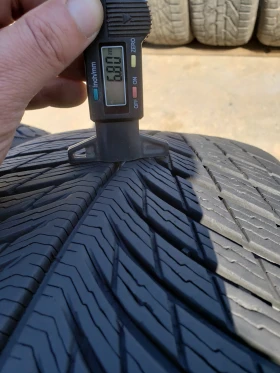 Гуми Зимни 235/50R20, снимка 10