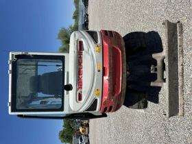      Takeuchi TB230