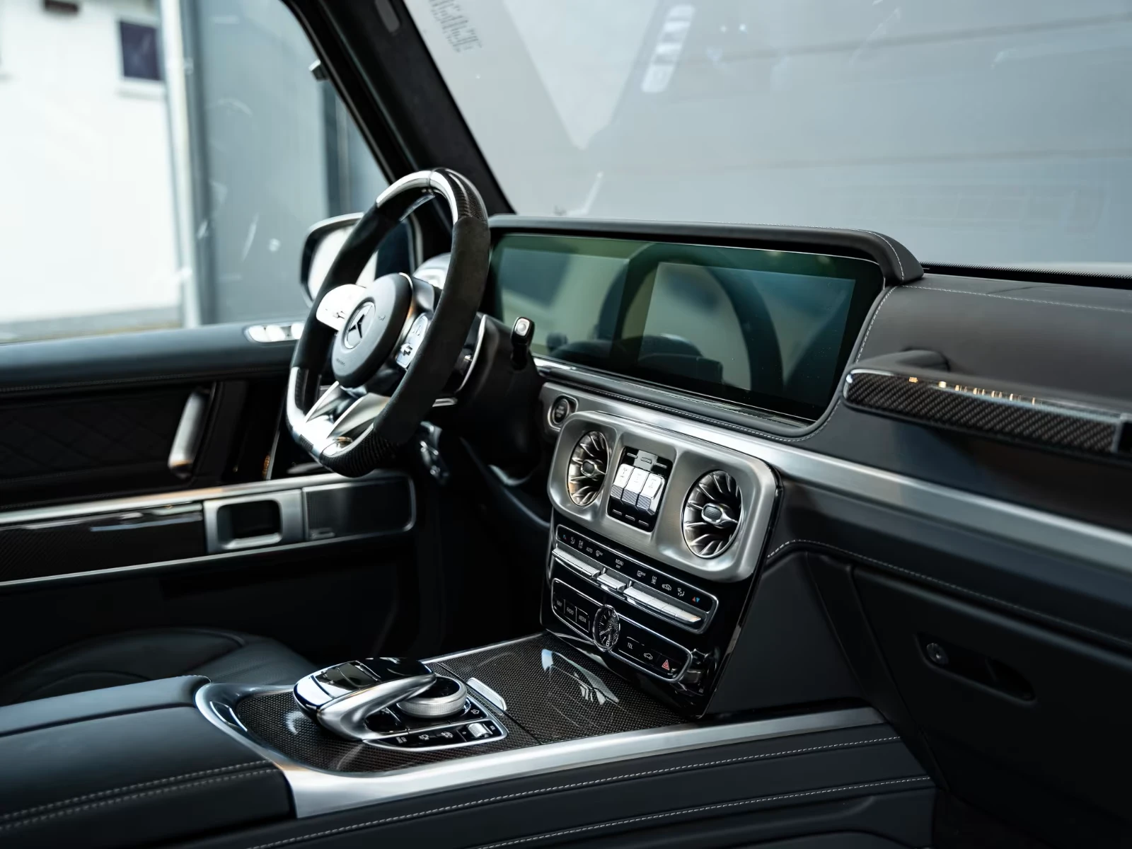 Mercedes-Benz G 63 AMG BRABUS-700* CARBON* TV* BURM* DISTR* 360CAM* MEMOR, снимка 14 - Автомобили и джипове - 55686904