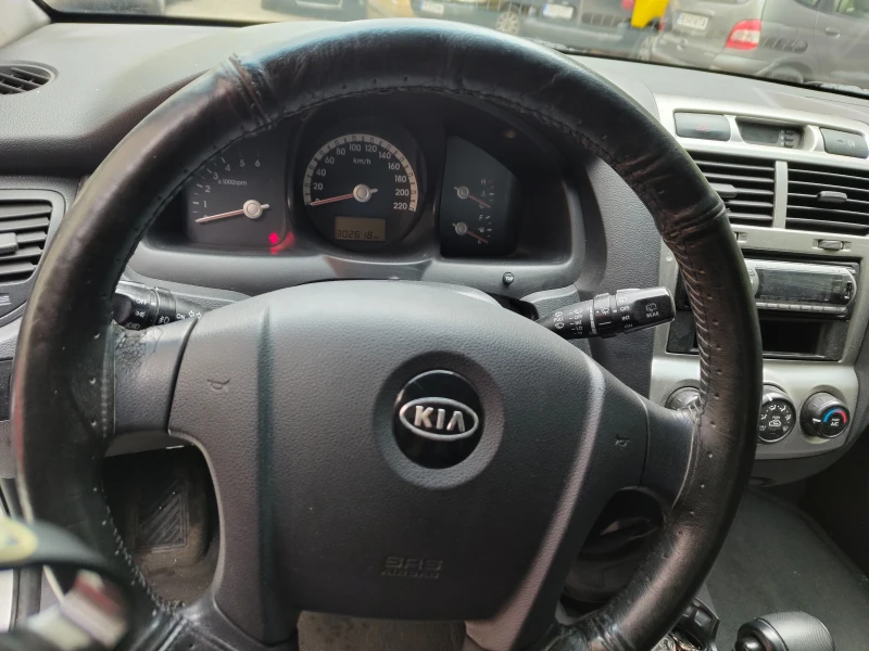 Kia Sportage, снимка 13 - Автомобили и джипове - 47489596