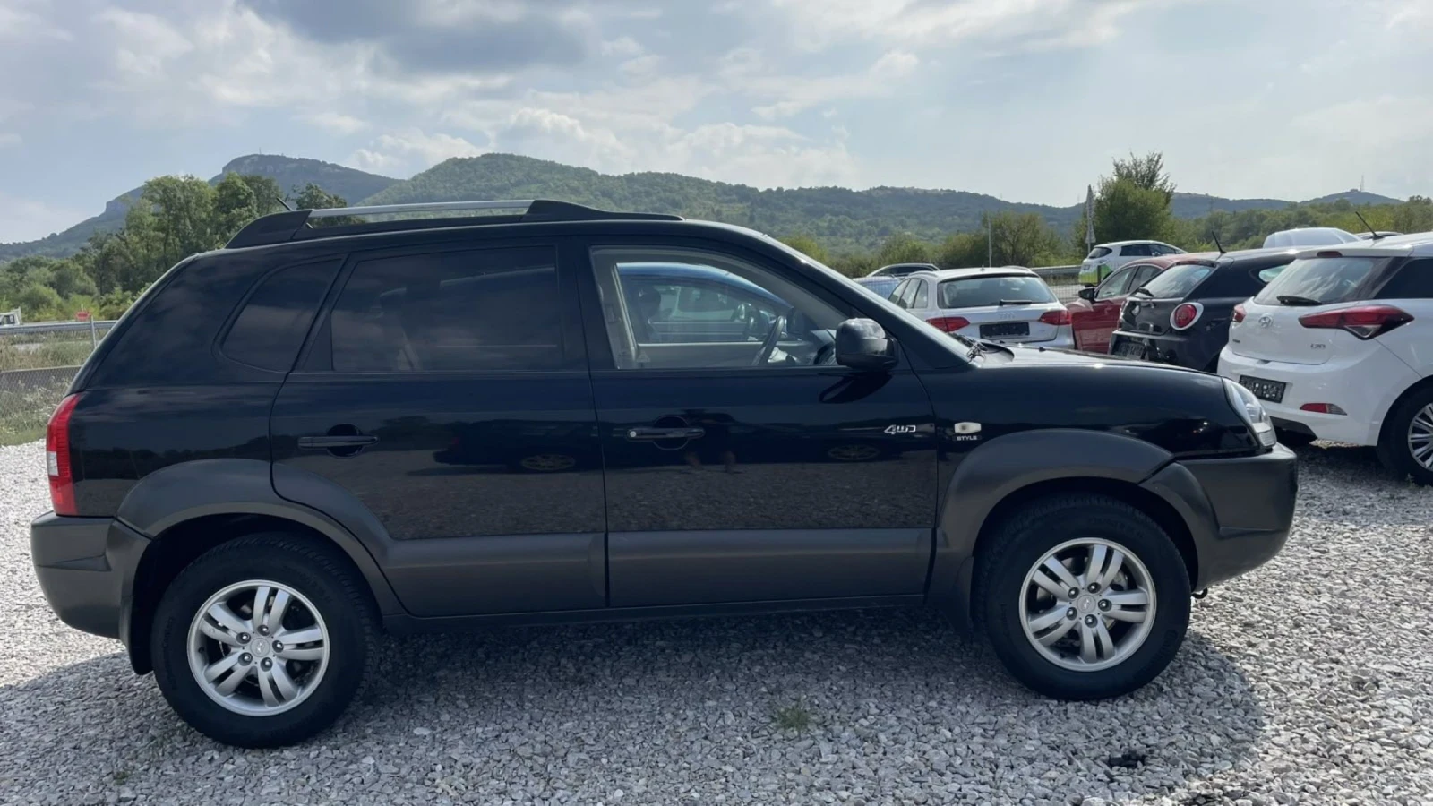 Hyundai Tucson 2.7i kli 4x4 Avtomat - изображение 9
