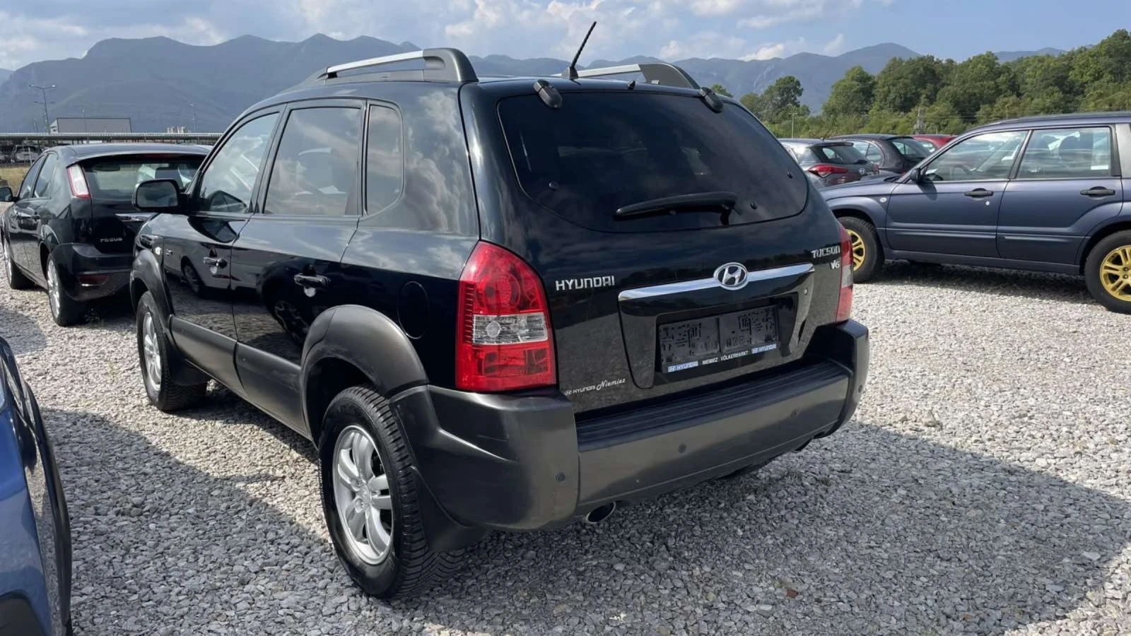 Hyundai Tucson 2.7i kli 4x4 Avtomat - изображение 10