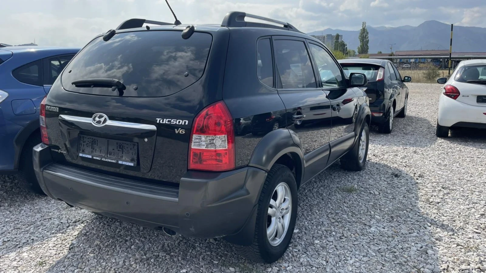Hyundai Tucson 2.7i kli 4x4 Avtomat - изображение 7