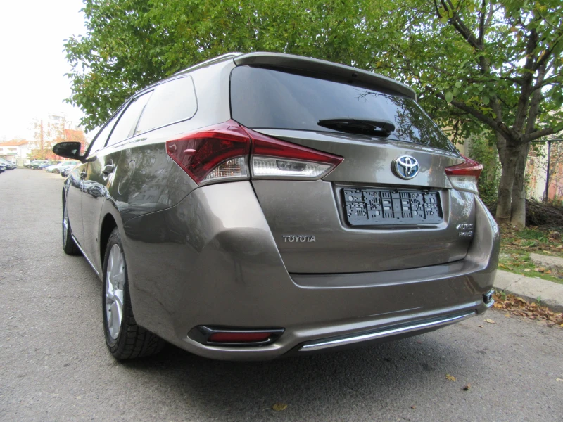 Toyota Auris 1.8 HYBRID/AUT/NAVI/EURO6, снимка 8 - Автомобили и джипове - 47668656