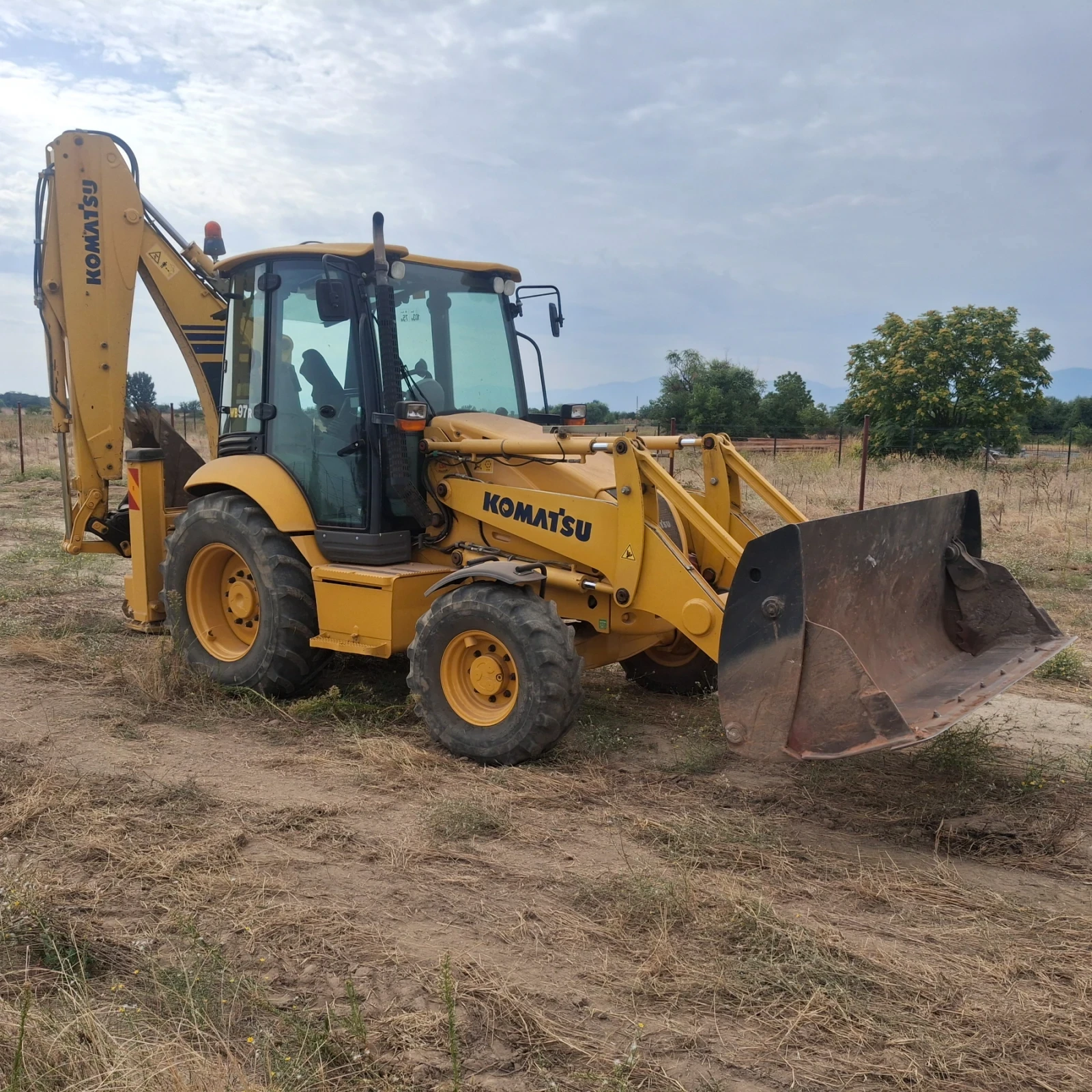 Багер Komatsu Wb97-5