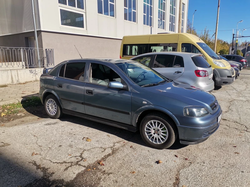 Opel Astra 1.6 моно, снимка 14 - Автомобили и джипове - 51648573