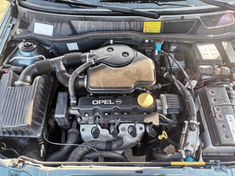 Opel Astra 1.6 моно, снимка 10 - Автомобили и джипове - 51648573