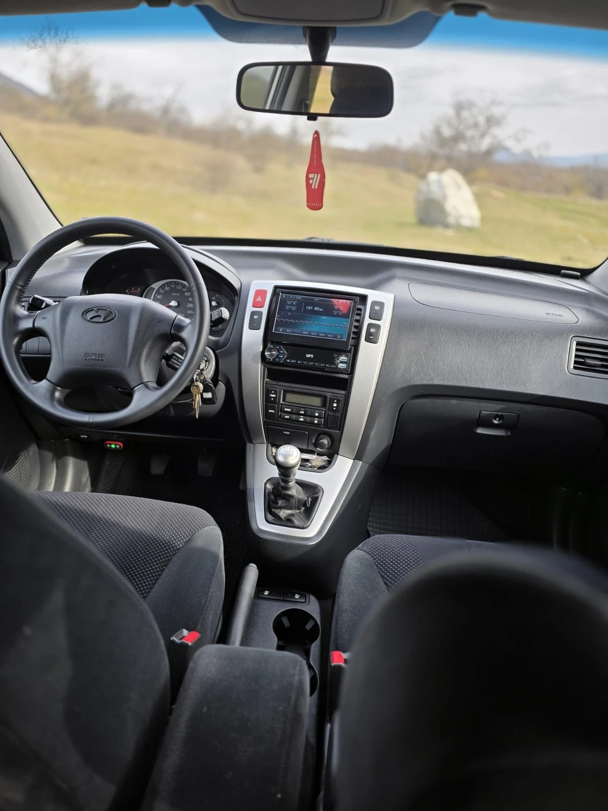 Hyundai Tucson 2.0 140 kc, снимка 12 - Автомобили и джипове - 53915837