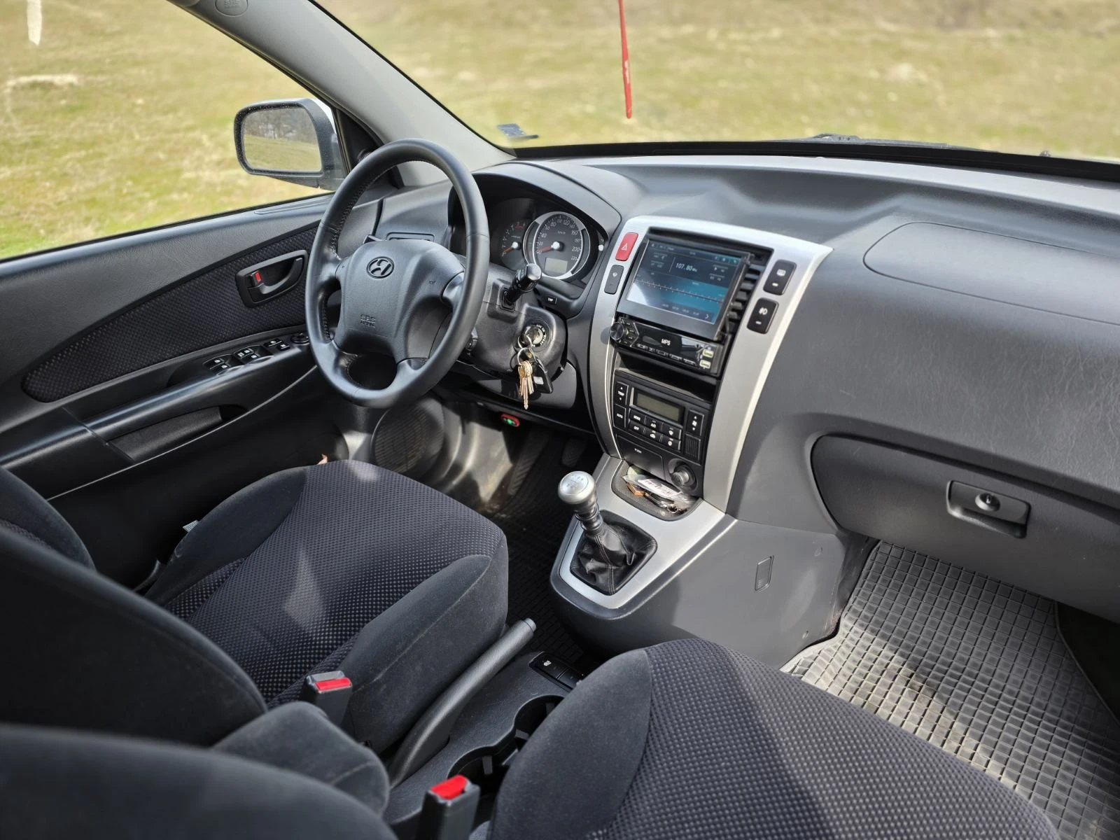 Hyundai Tucson 2.0 140 kc, снимка 14 - Автомобили и джипове - 53915837