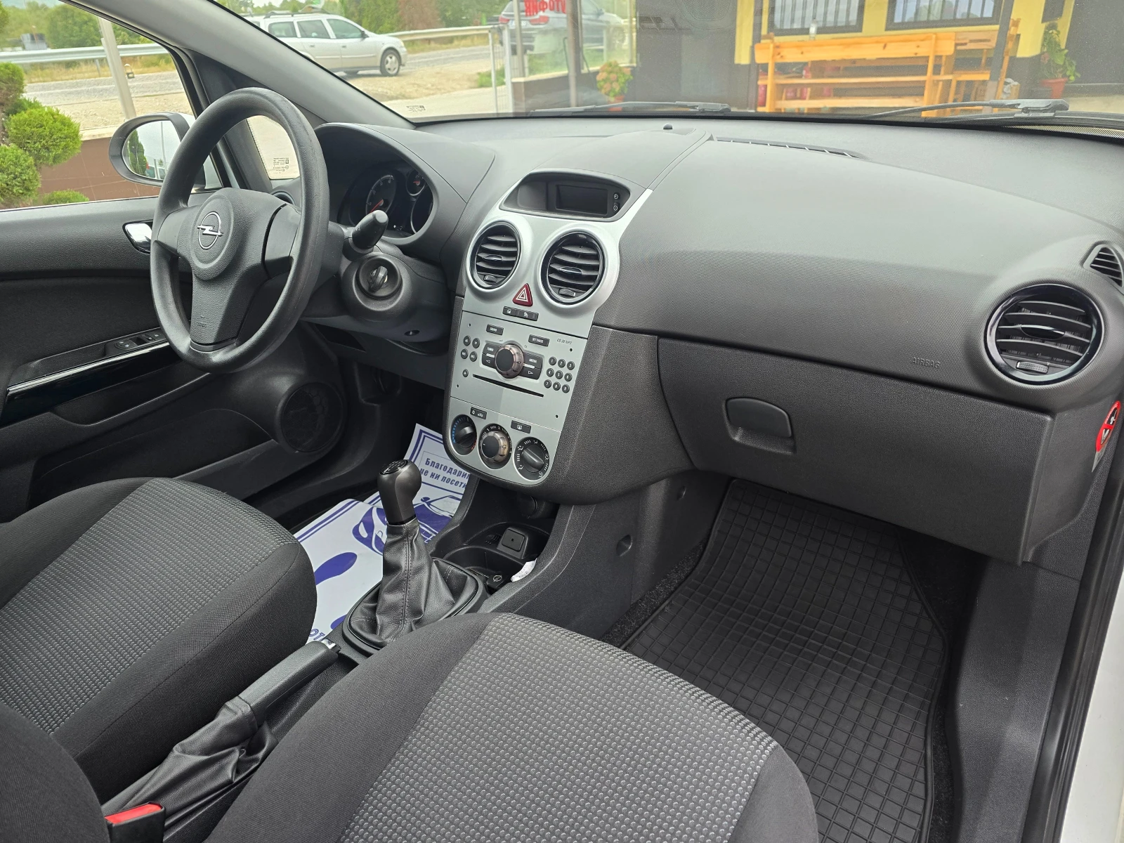 Opel Corsa 1.2 КЛИМАТИК РЕАЛНИ КИЛОМЕТРИ - изображение 9