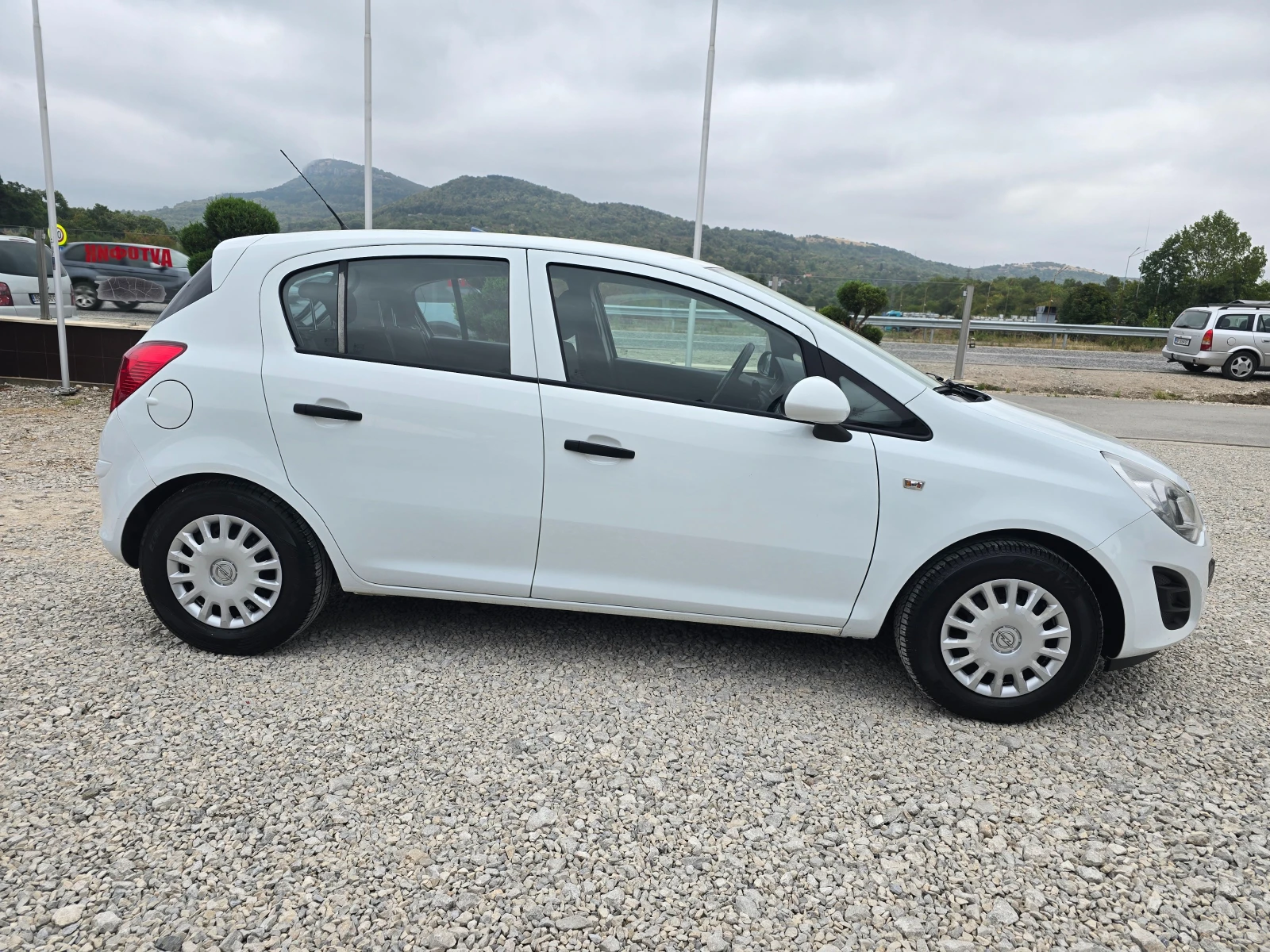 Opel Corsa 1.2 КЛИМАТИК РЕАЛНИ КИЛОМЕТРИ - изображение 6
