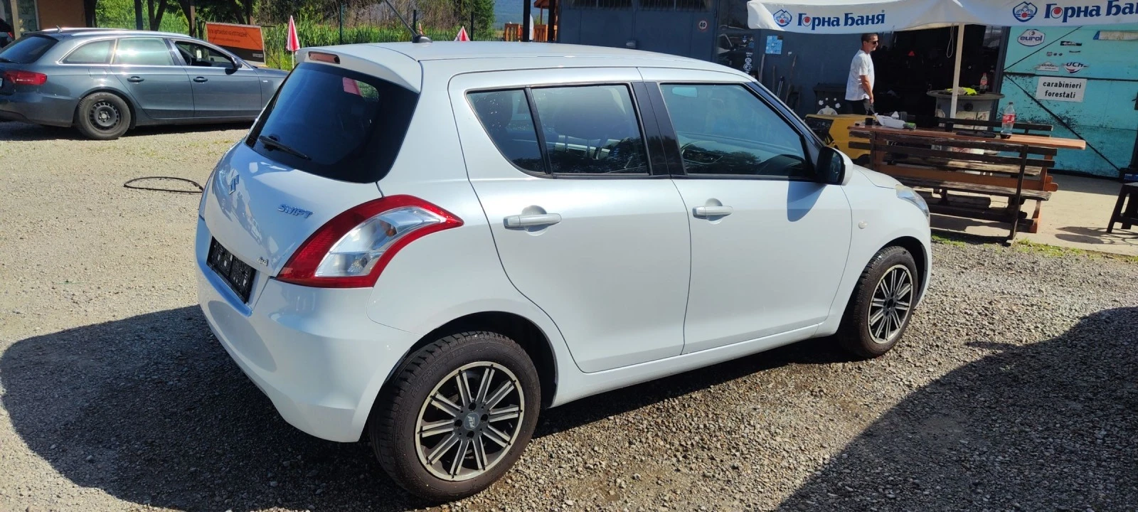 Suzuki Swift 1.3 I 4#4 - изображение 3