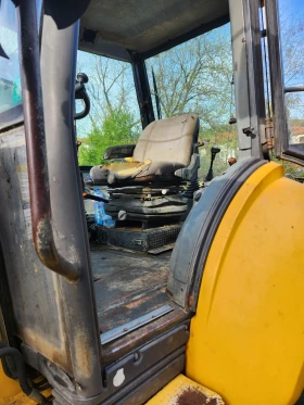 Багер New Holland LB115B, снимка 8
