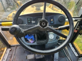 Багер New Holland LB115B, снимка 11