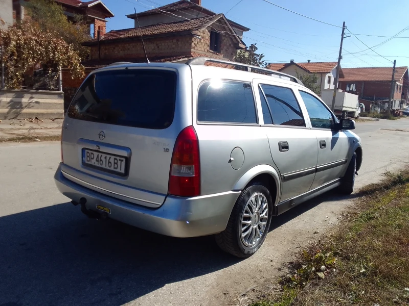 Opel Astra 1.6 ГАЗ, снимка 16 - Автомобили и джипове - 47718027