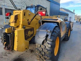 Телескопични товарачи Caterpillar TH 407, снимка 3