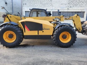 Телескопични товарачи Caterpillar TH 407, снимка 1