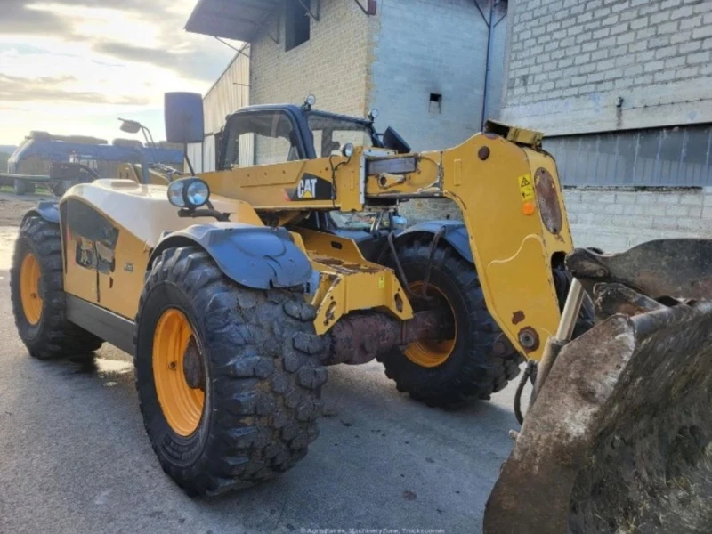 Телескопични товарачи Caterpillar TH 407, снимка 5 - Индустриална техника - 48451518