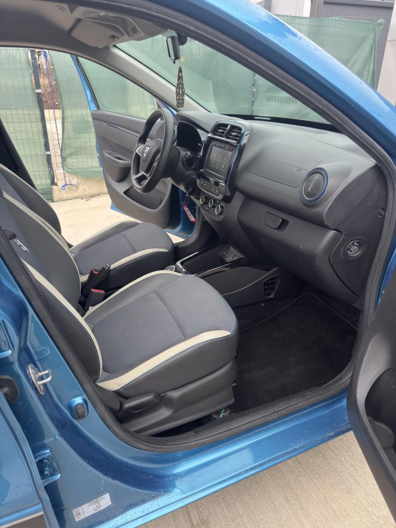 Dacia Spring CCS/NAVI/KAMEРA/ПАРКТРОНИК/SWISS!, снимка 9 - Автомобили и джипове - 52999739