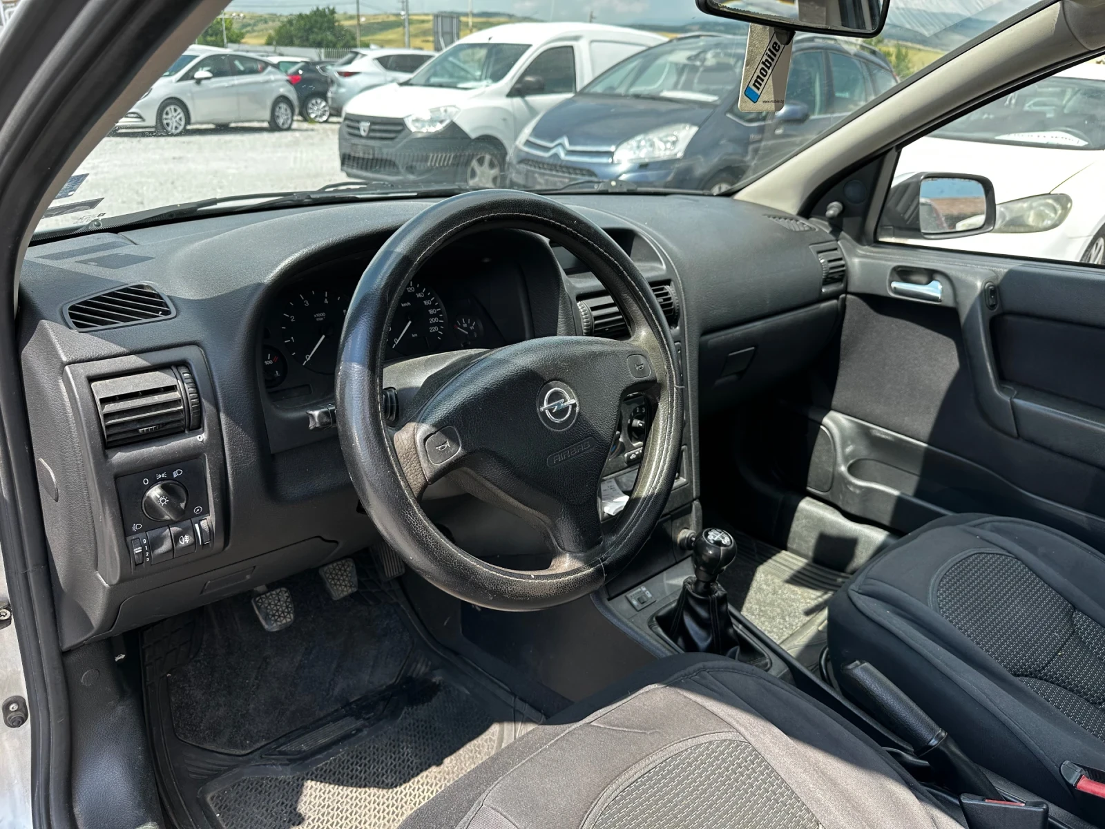 Opel Astra 1.4i-90кс - изображение 8