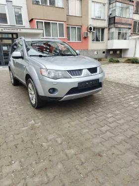 Mitsubishi Outlander 2.4 бензин/газ 4х4 кожа/автоматик/люк/нави - 6300 € / 12321.73 лв. - 51344201 8