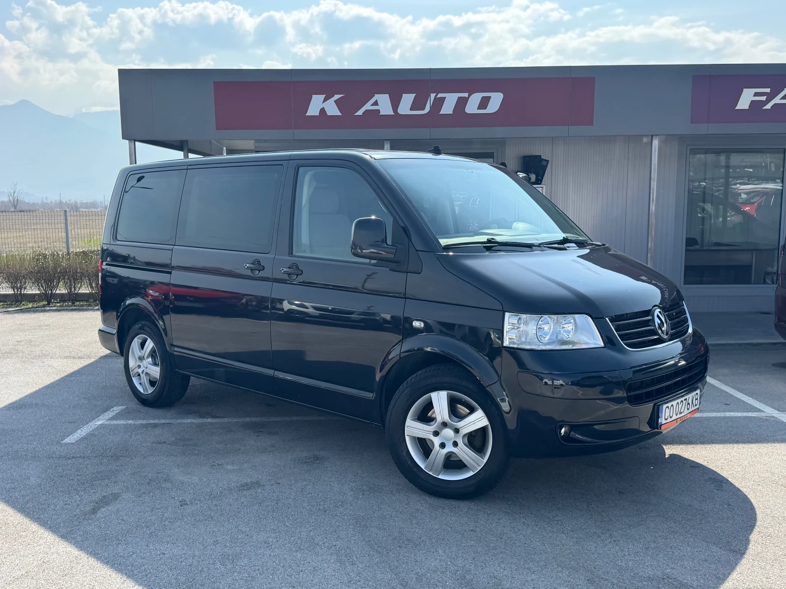 VW Multivan 2.5 / 4Motion / Navi / Подгрев, снимка 4 - Бусове и автобуси - 53754191