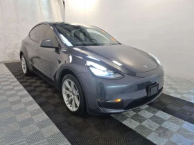 Tesla Model Y LONG RANGE| PARK ASSIST| PANORAMA| CARFAX|  - 25000 € / 48895.75 лв. - 22806111 2