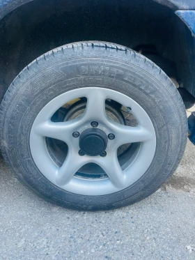        215/65R16  Suzuki Grand vitara